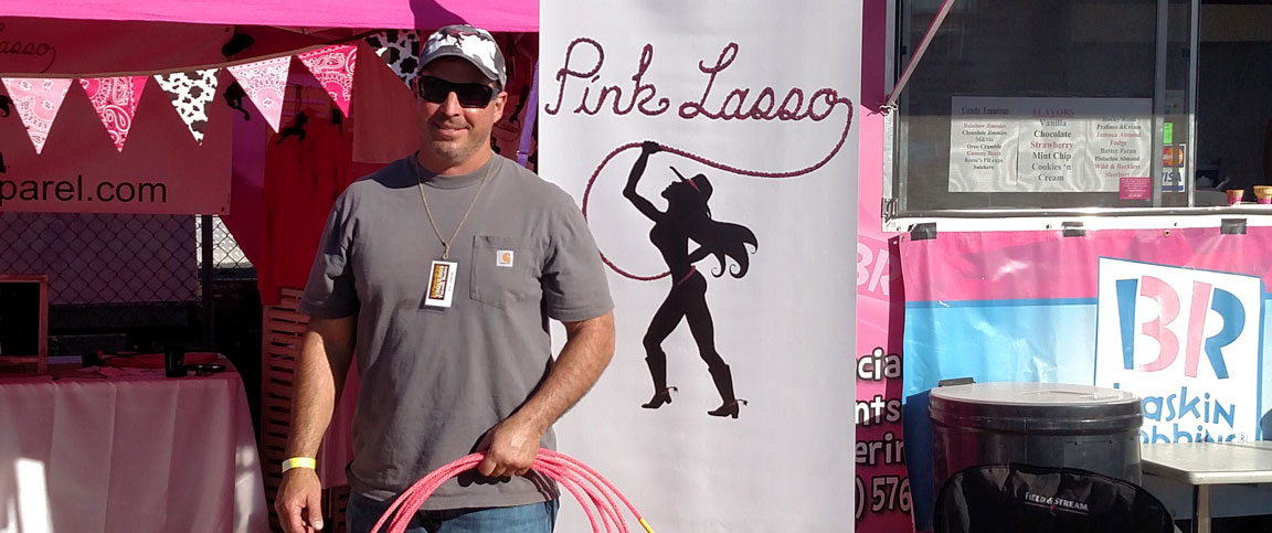 man holding pink lasso